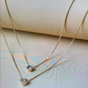 Elegant Gold Necklace with Crystal Pendant